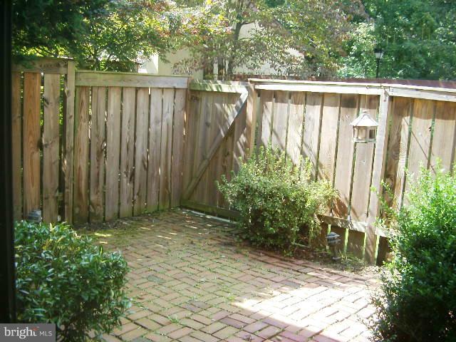 11236 B Powder Run, Unit B Columbia, MD 21044 - Photo 2 of 7 a view of a backyard with pathway