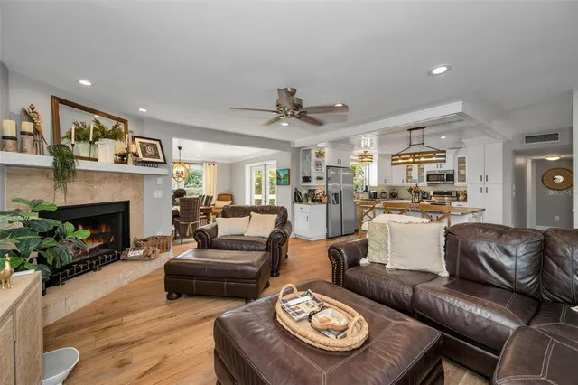 a bathroom with a granite countertop double vanity sink and a mirror