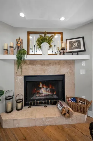 a white bath tub sitting next to a white toilet