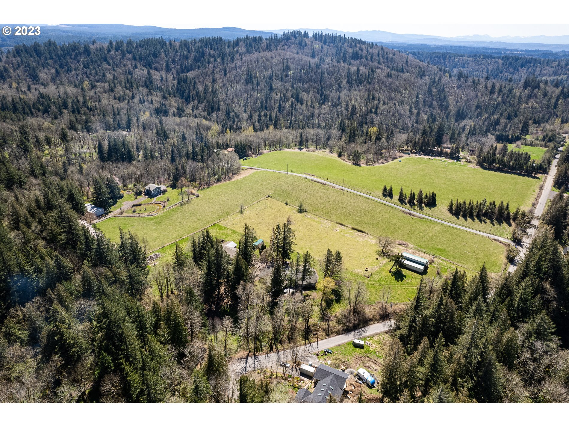 930 Northeast Salzman Road Corbett, OR 97019 - Photo 32 of 32 a view of a swimming pool with a yard