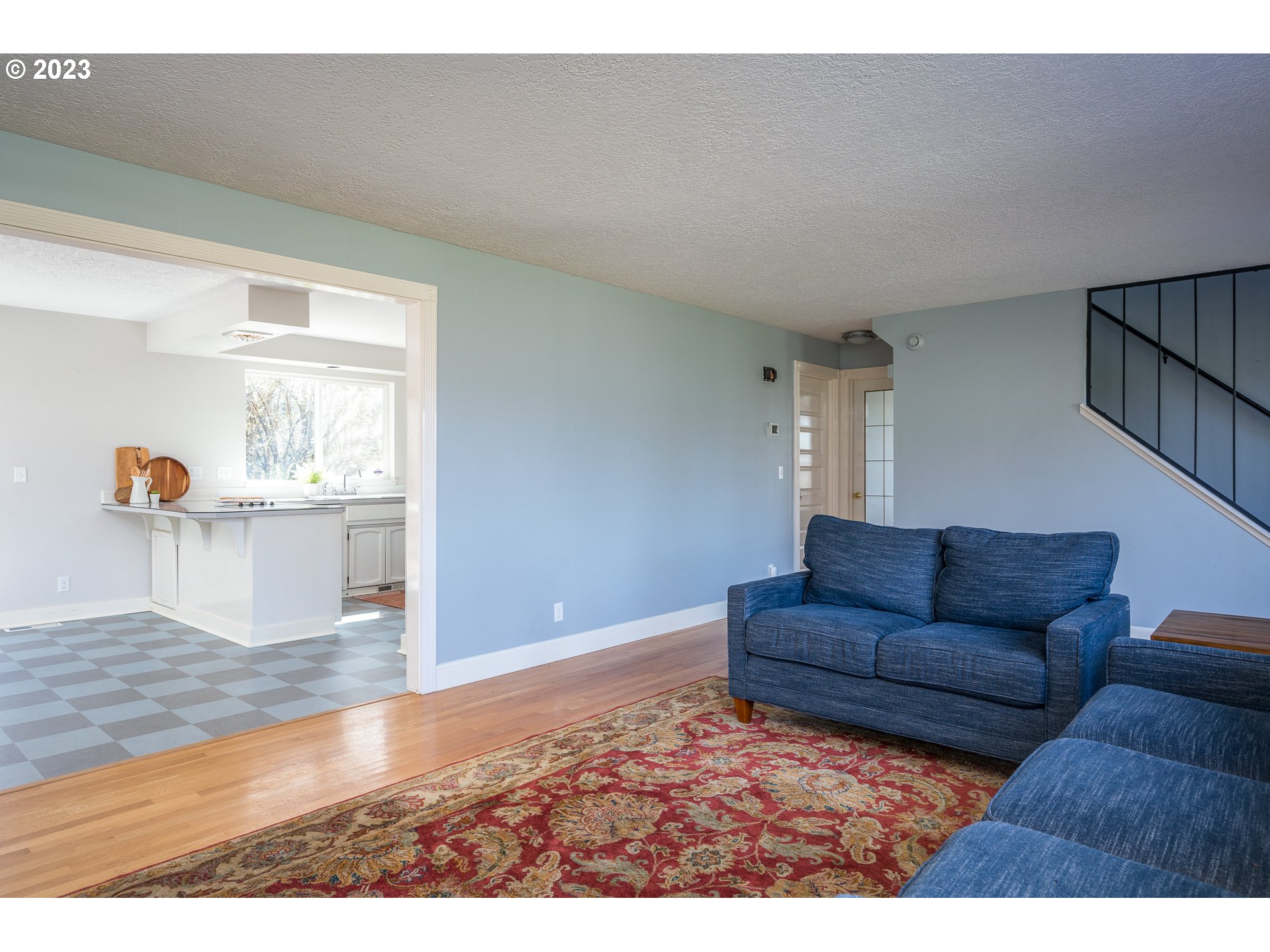 930 Northeast Salzman Road Corbett, OR 97019 - Photo 6 of 32 a living room with furniture and view of kitchen