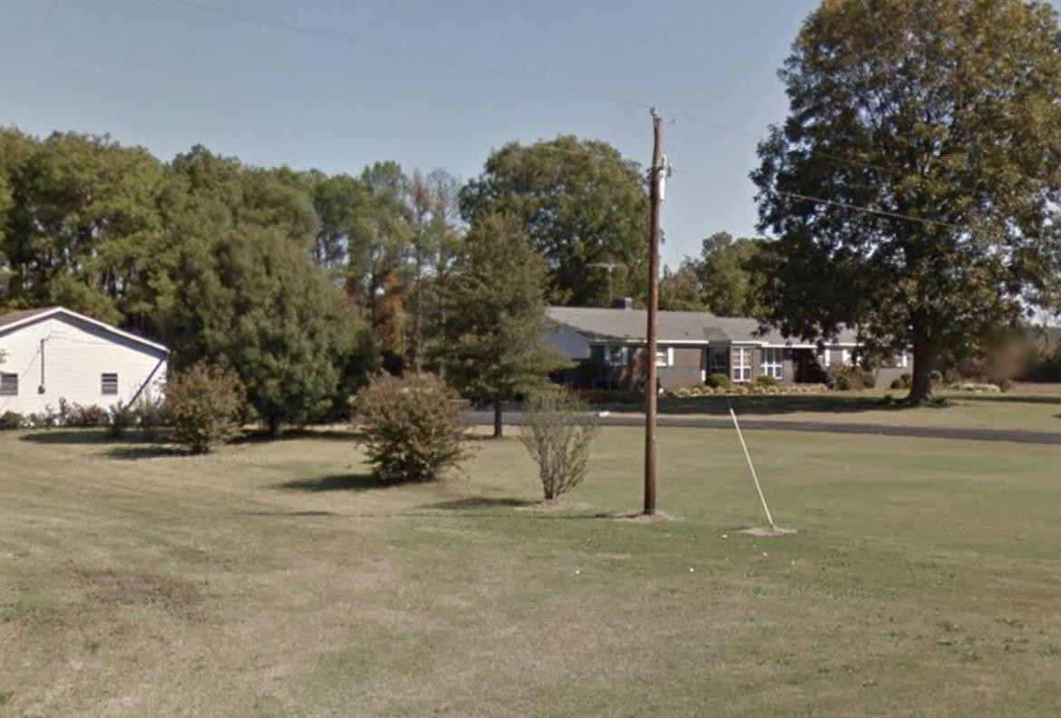1590 Manley Road Alamo, TN 38001 - Photo 1 of 1 a view of a park with swings and slides