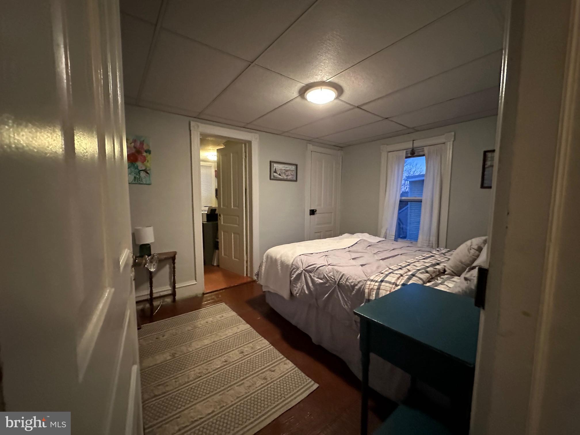 212 Main Street Red Hill, PA 18076 - Photo 15 of 18 a bedroom with a bed and a mirror