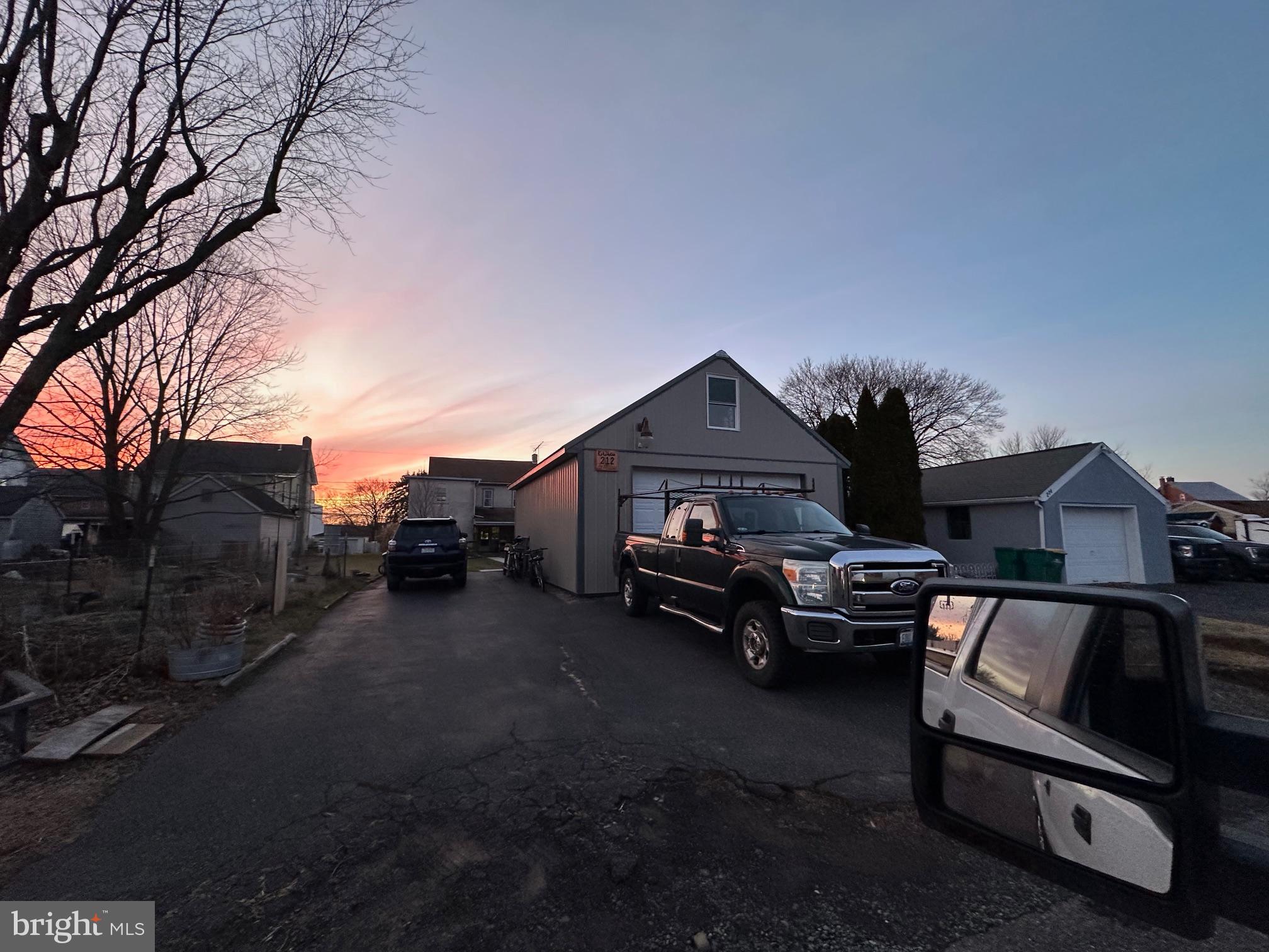 212 Main Street Red Hill, PA 18076 - Photo 4 of 18 a view of a street with cars on road