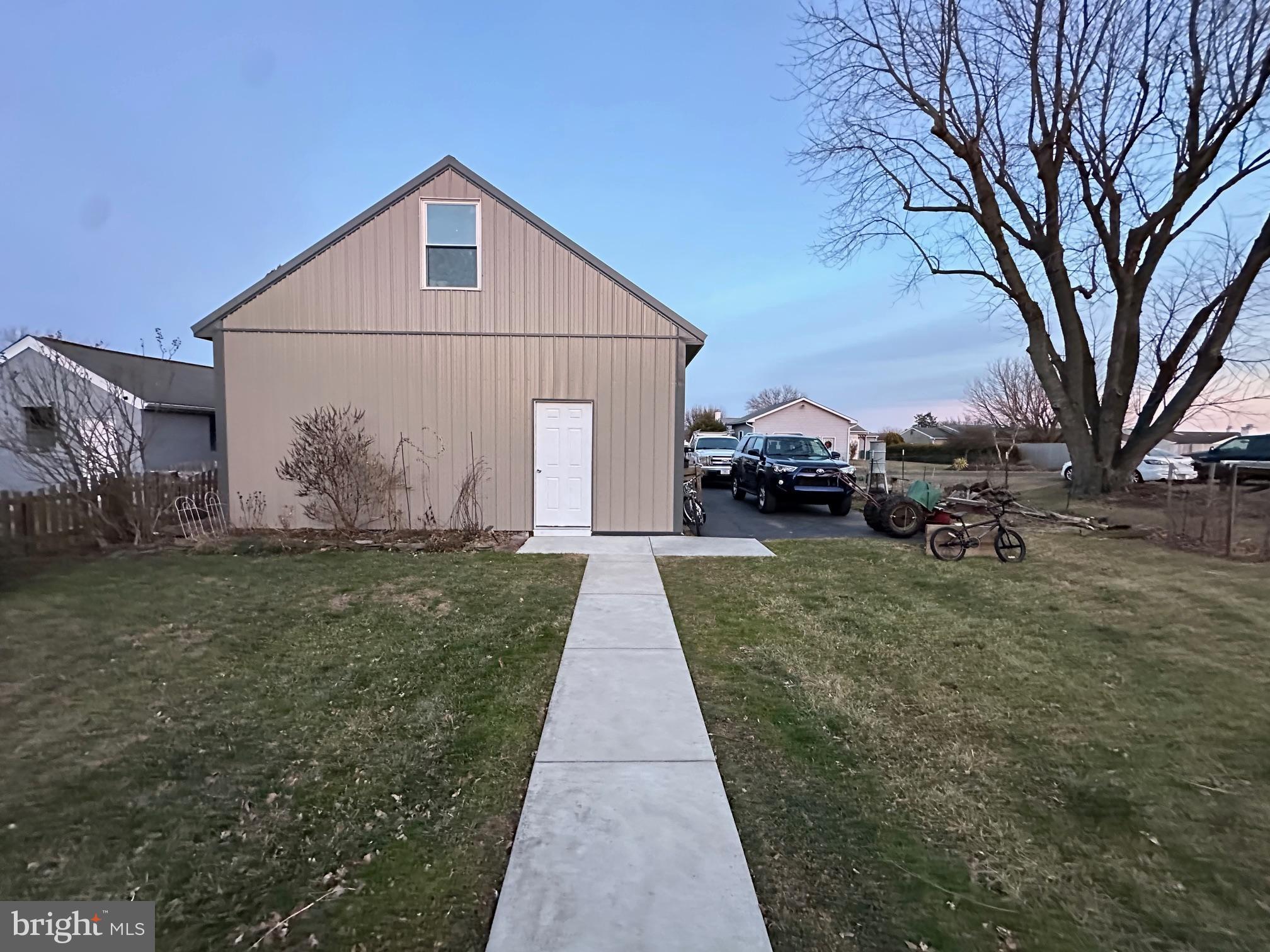 212 Main Street Red Hill, PA 18076 - Photo 5 of 18 a front view of a house with garden
