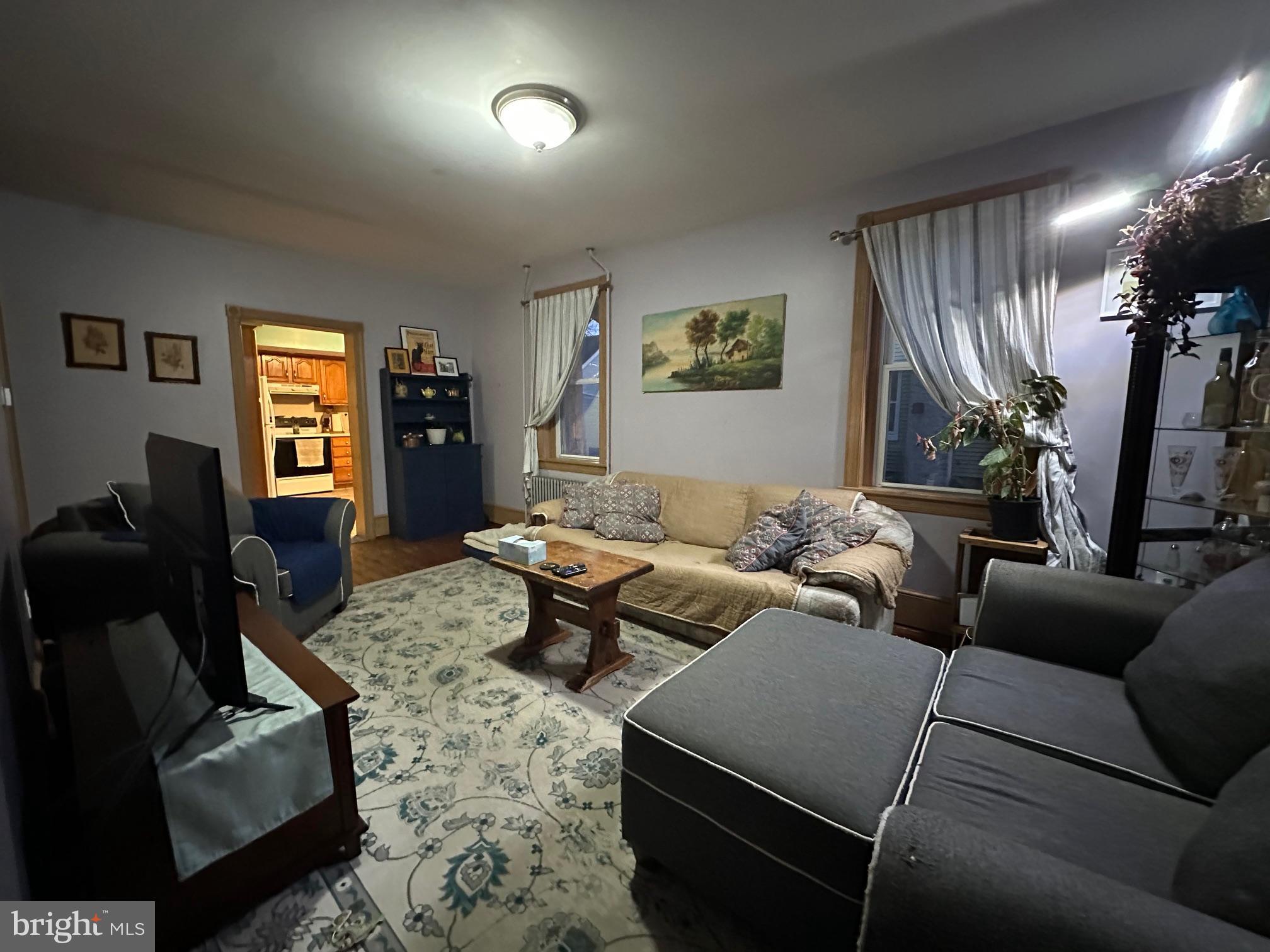 212 Main Street Red Hill, PA 18076 - Photo 6 of 18 a living room with furniture and a window