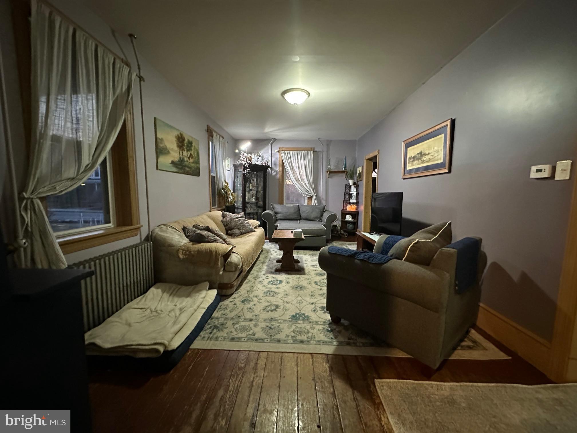 212 Main Street Red Hill, PA 18076 - Photo 7 of 18 a living room with furniture and a window