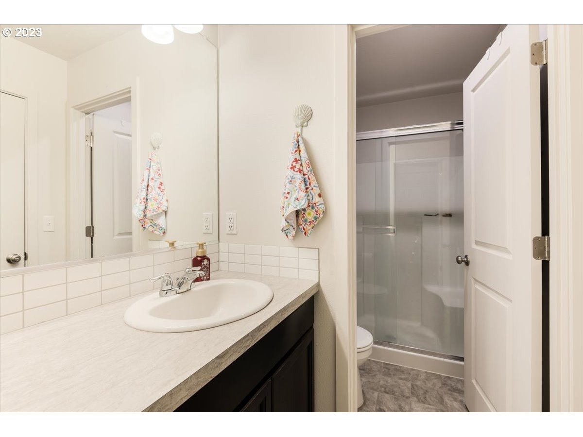 2375 Southeast 16th Street Gresham, OR 97080 - Photo 17 of 28 a bathroom with a sink and a mirror