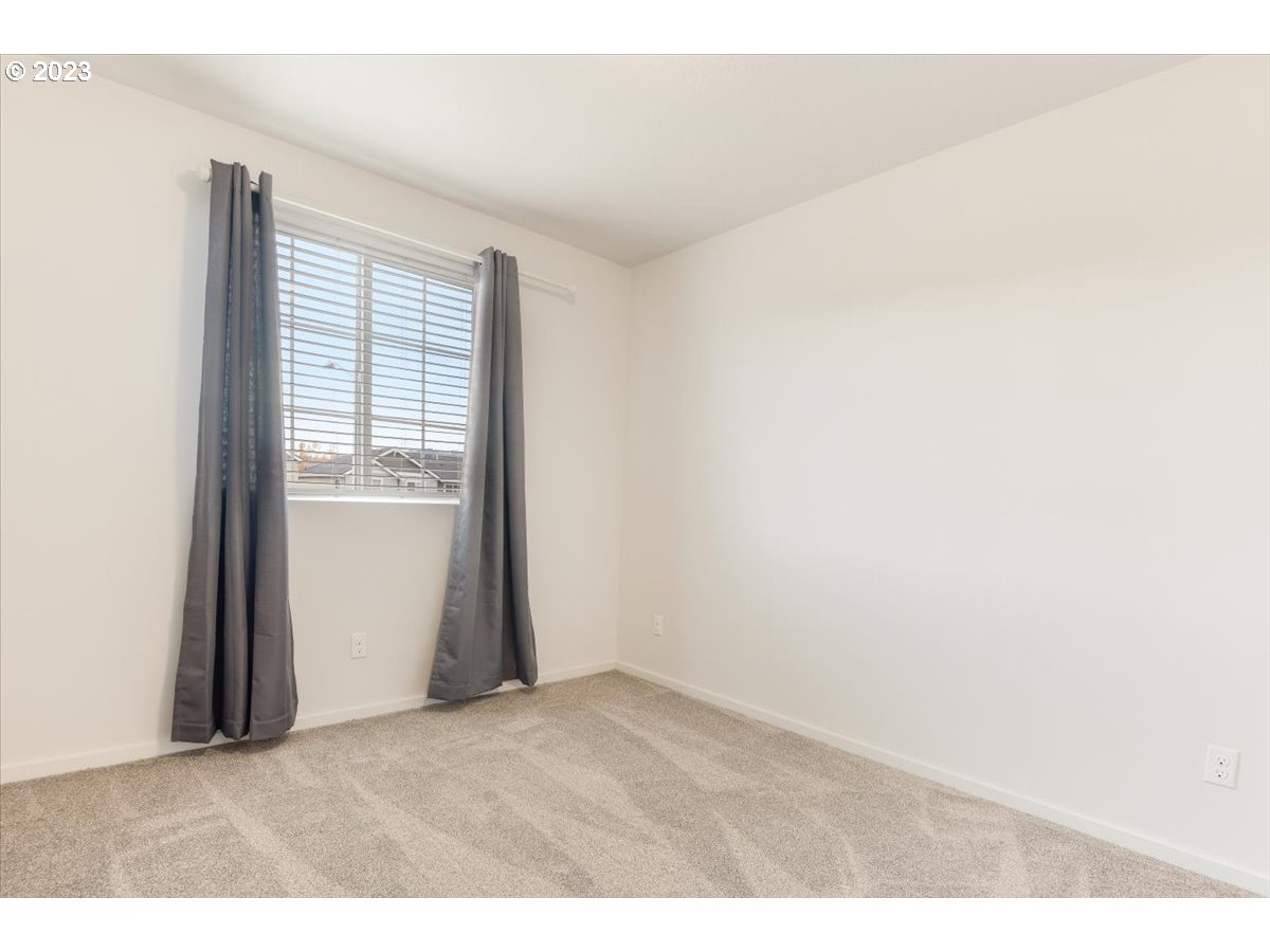 2375 Southeast 16th Street Gresham, OR 97080 - Photo 20 of 28 a big room with closet and wooden floor