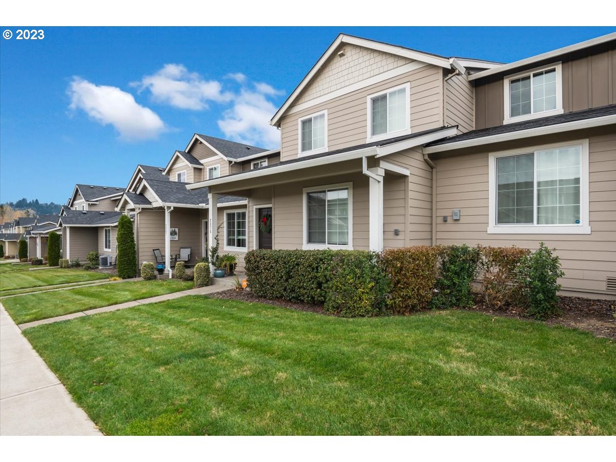 2375 Southeast 16th Street Gresham, OR 97080 - Photo 4 of 28 a front view of a house with a yard