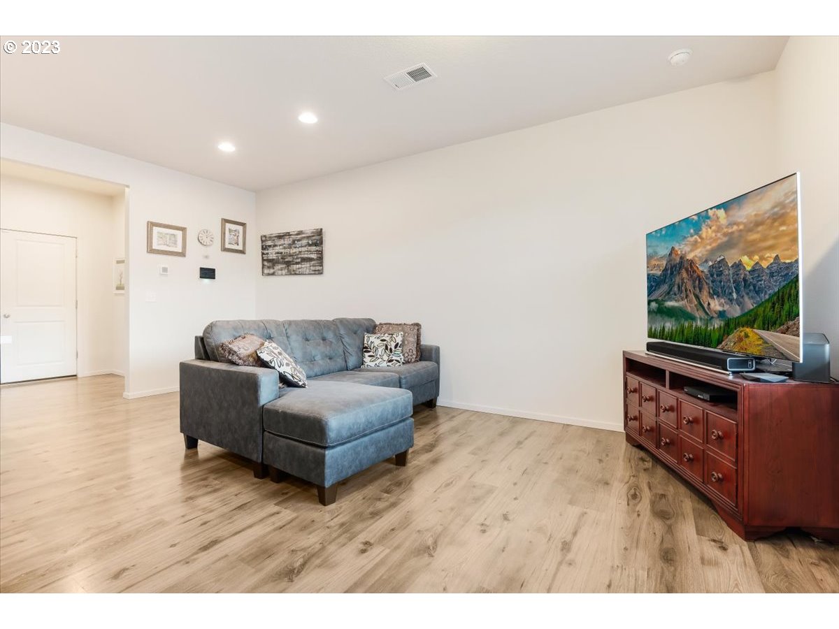 2375 Southeast 16th Street Gresham, OR 97080 - Photo 6 of 28 a living room with furniture and a flat screen tv