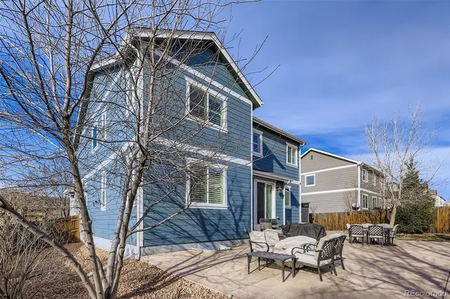 a view of a building with sitting area