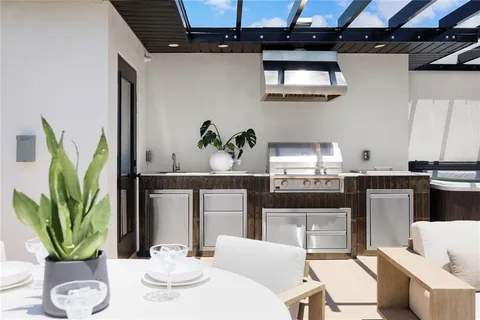 a kitchen with a table and chairs in it