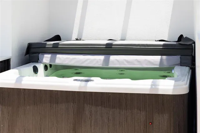 a view of room with wooden floor