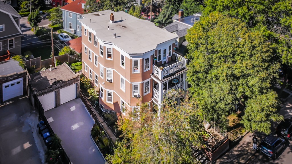 89 Montebello Road, Unit 2 Boston, MA 02130 - Photo 2 of 32 a aerial view of a house with a yard and fountain in middle of the house