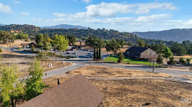 a view of a small yard in front of a house