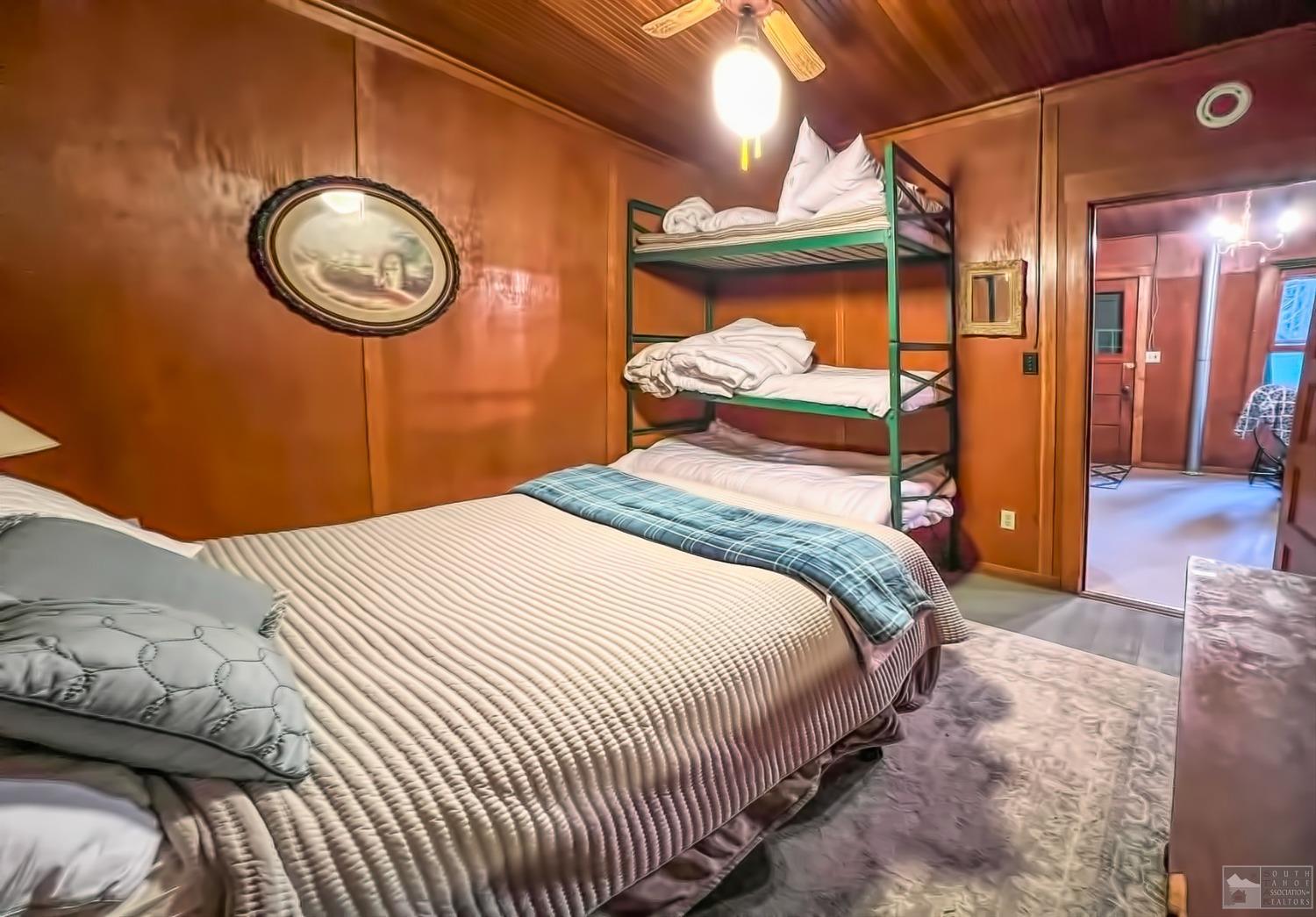 127 46 Milestone South Lake Tahoe, CA 95721 - Photo 13 of 22 a bedroom with a bed and a lamp with the mirror