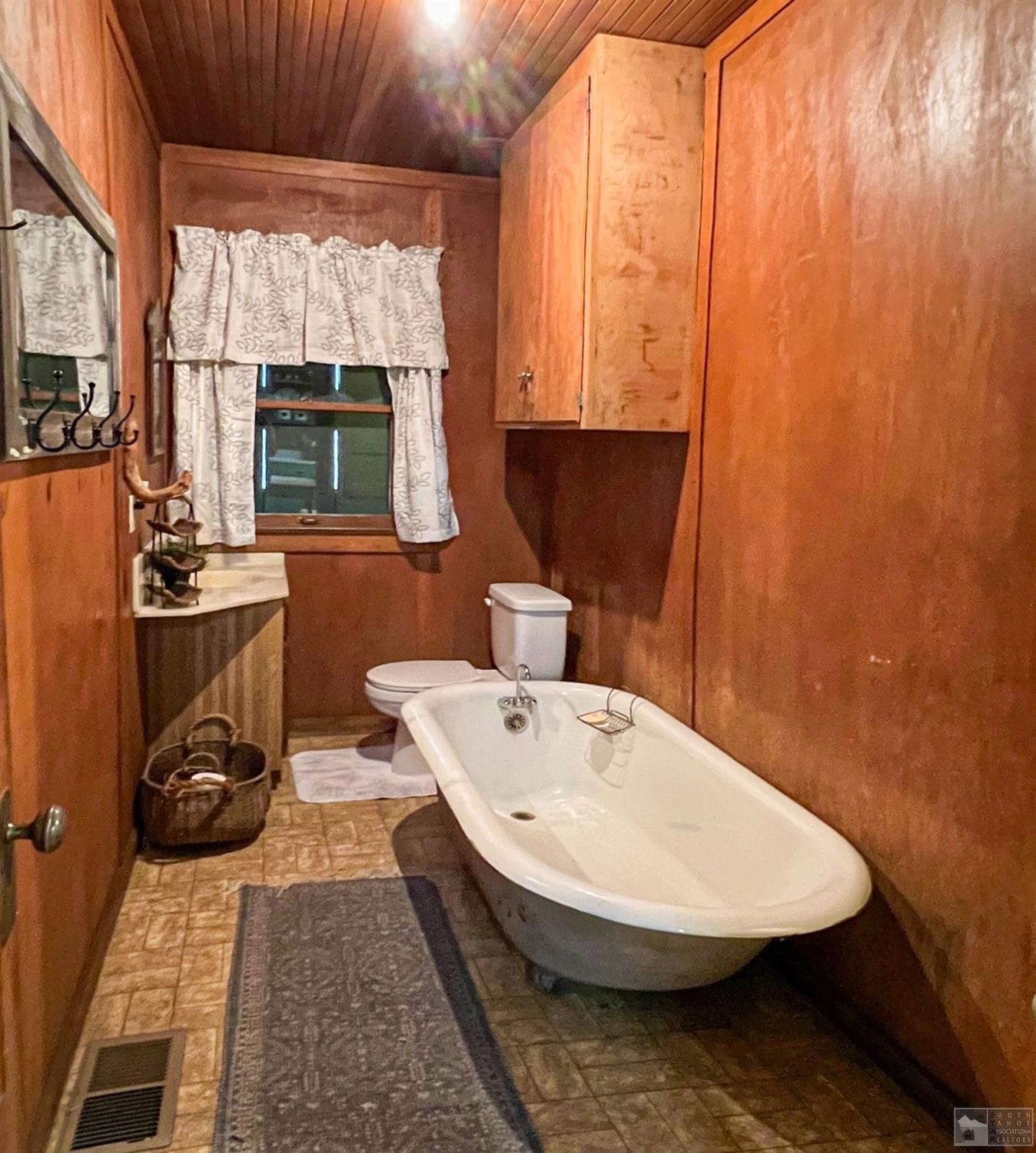 127 46 Milestone South Lake Tahoe, CA 95721 - Photo 14 of 22 a bathroom with a sink a window and mirror