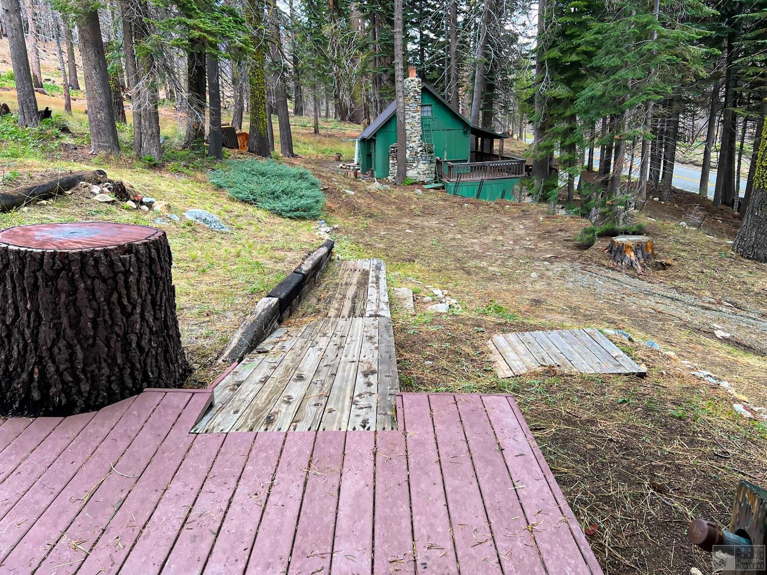 127 46 Milestone South Lake Tahoe, CA 95721 - Photo 19 of 22 a view of outdoor space with wooden floor and trees