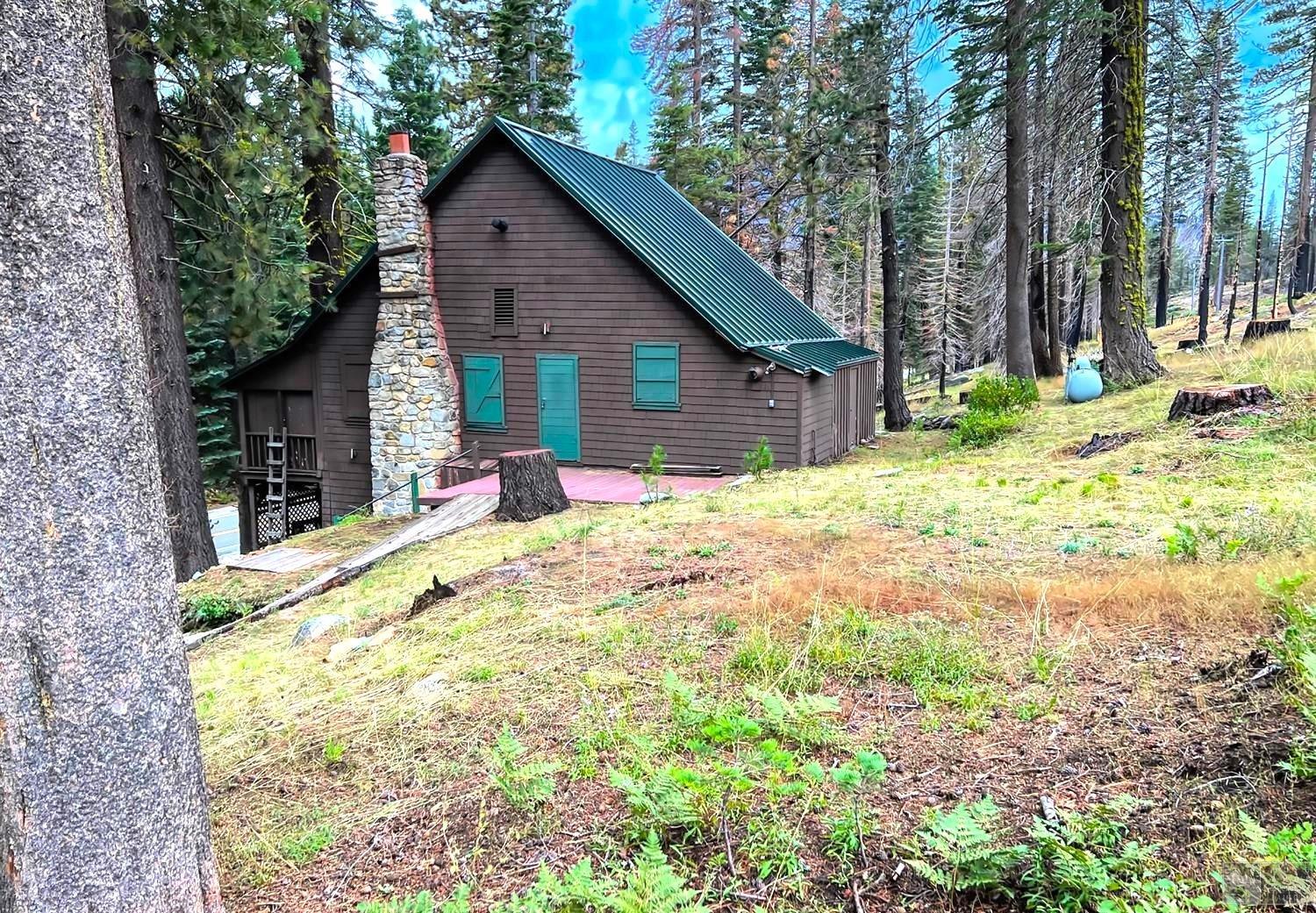 127 46 Milestone South Lake Tahoe, CA 95721 - Photo 20 of 22 a view of a house with a yard covered in snow