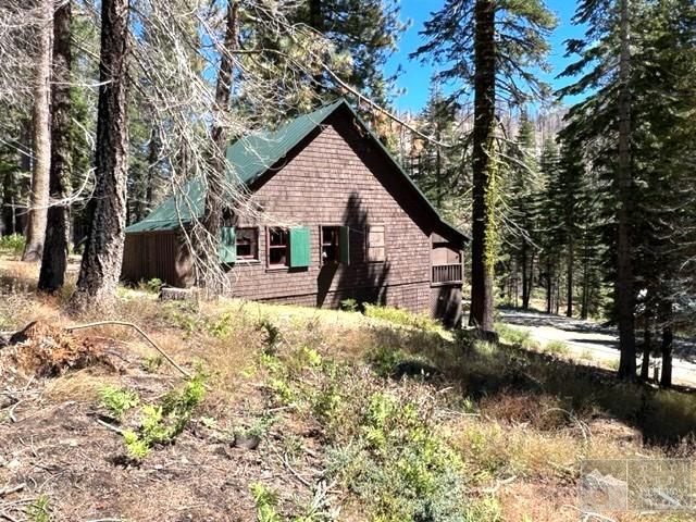 127 46 Milestone South Lake Tahoe, CA 95721 - Photo 2 of 22 a view of a house with snow in the yard