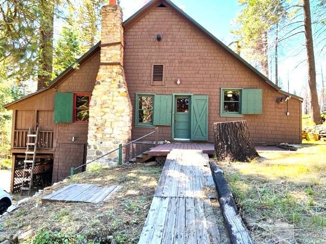 127 46 Milestone South Lake Tahoe, CA 95721 - Photo 3 of 22 a view of a house with a yard