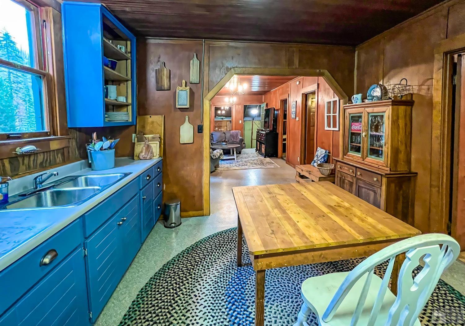 127 46 Milestone South Lake Tahoe, CA 95721 - Photo 9 of 22 a room with stainless steel appliances kitchen island granite countertop a refrigerator a sink and dishwasher