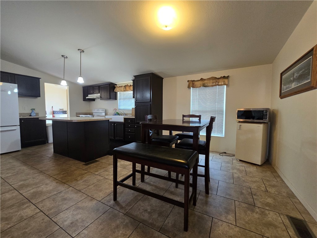 3689 North Avra Road Golden Valley, AZ 86413 - Photo 2 of 32 Dining space featuring baseboards