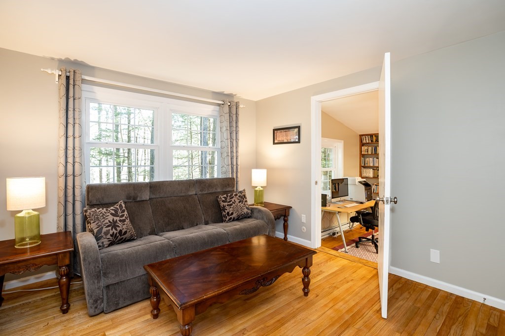 19 Pebble Ridge Road Amherst, MA 01002 - Photo 14 of 42 a living room with furniture and a window
