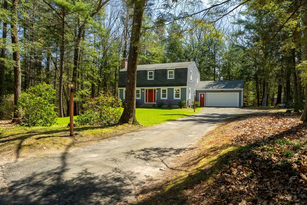 19 Pebble Ridge Road Amherst, MA 01002 - Photo 2 of 42 a view of a house with backyard and trees
