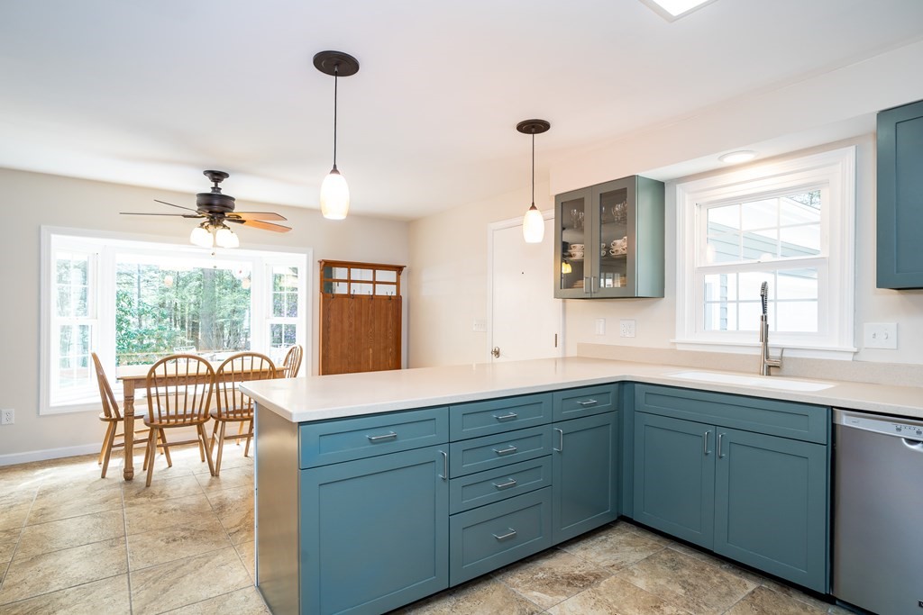 19 Pebble Ridge Road Amherst, MA 01002 - Photo 23 of 42 a kitchen with a table chairs and entryway