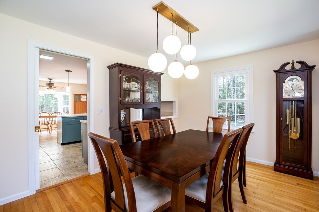 19 Pebble Ridge Road Amherst, MA 01002 - Photo 27 of 42 a view of a dining room with furniture and wooden floor