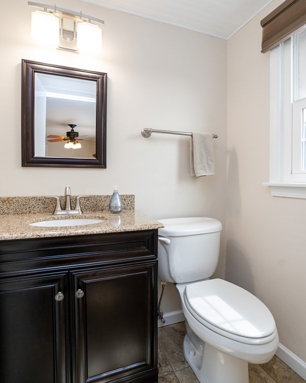 19 Pebble Ridge Road Amherst, MA 01002 - Photo 28 of 42 a bathroom with a toilet a sink and mirror