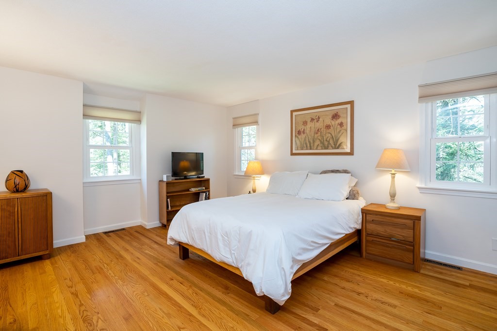 19 Pebble Ridge Road Amherst, MA 01002 - Photo 30 of 42 a bedroom with a bed and a tv