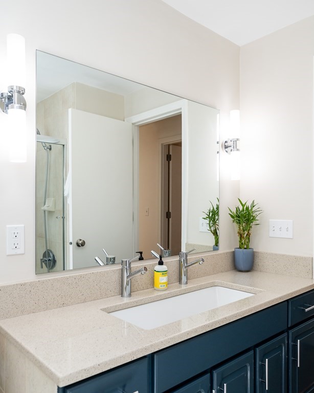 19 Pebble Ridge Road Amherst, MA 01002 - Photo 33 of 42 a bathroom with a sink and a mirror