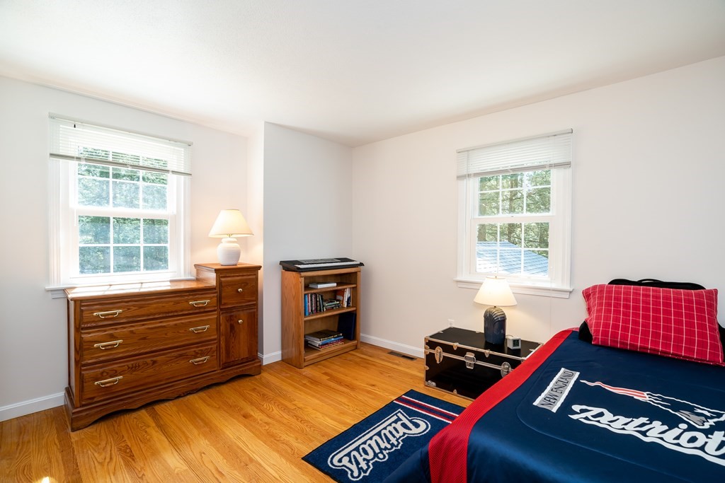 19 Pebble Ridge Road Amherst, MA 01002 - Photo 35 of 42 a bedroom with a bed and a window