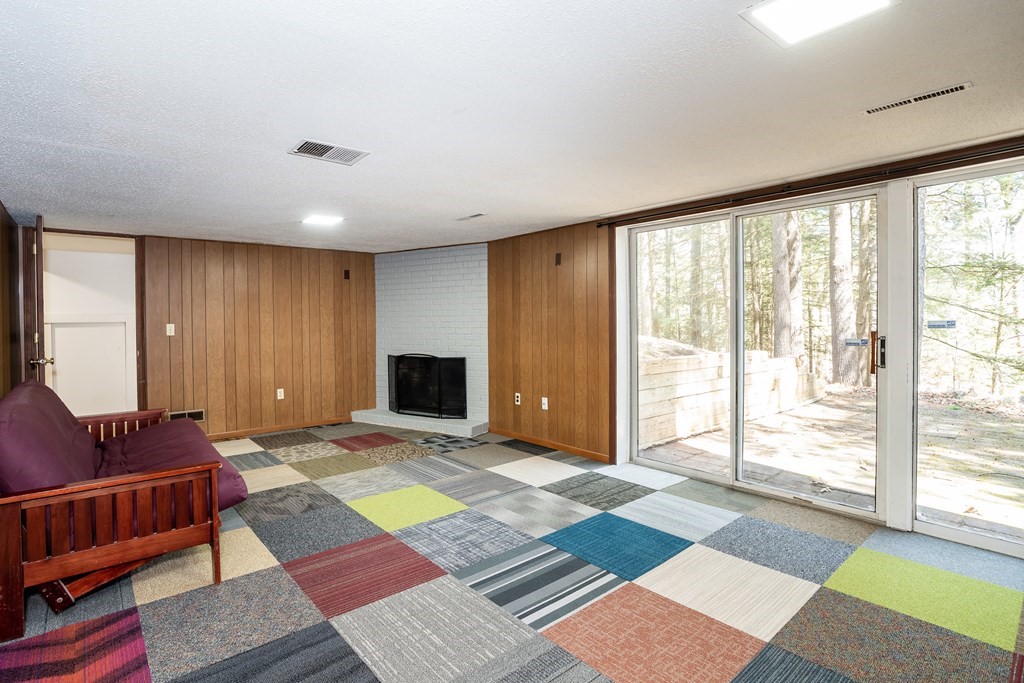 19 Pebble Ridge Road Amherst, MA 01002 - Photo 41 of 42 a view of a room with furniture and a rug