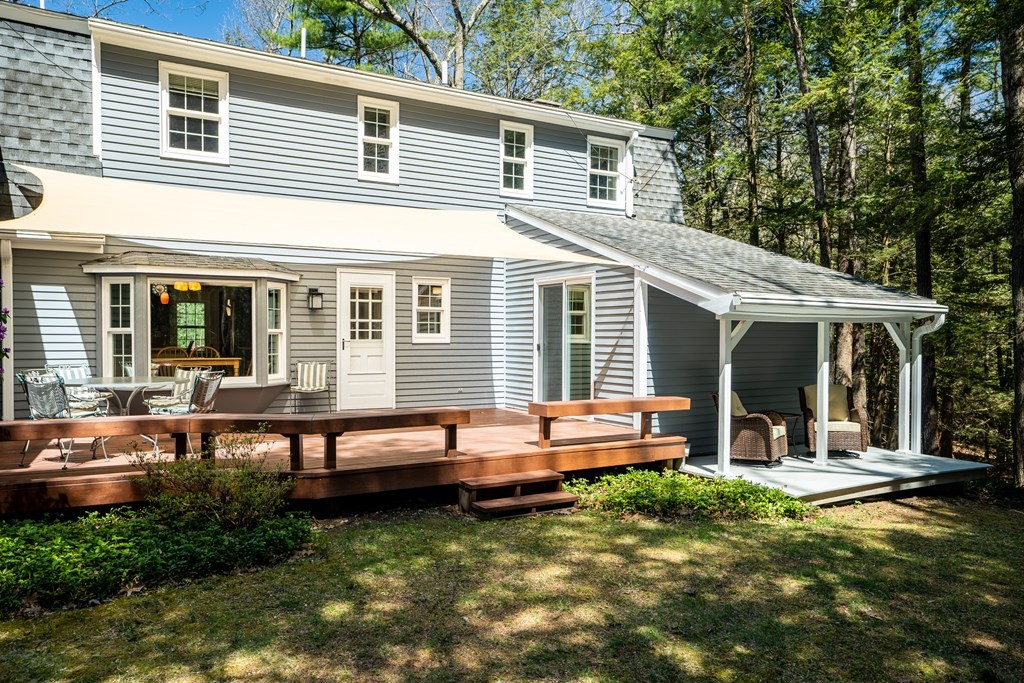 19 Pebble Ridge Road Amherst, MA 01002 - Photo 6 of 42 a house view with a seating space and garden space