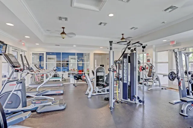 a view of a porch with furniture and garden