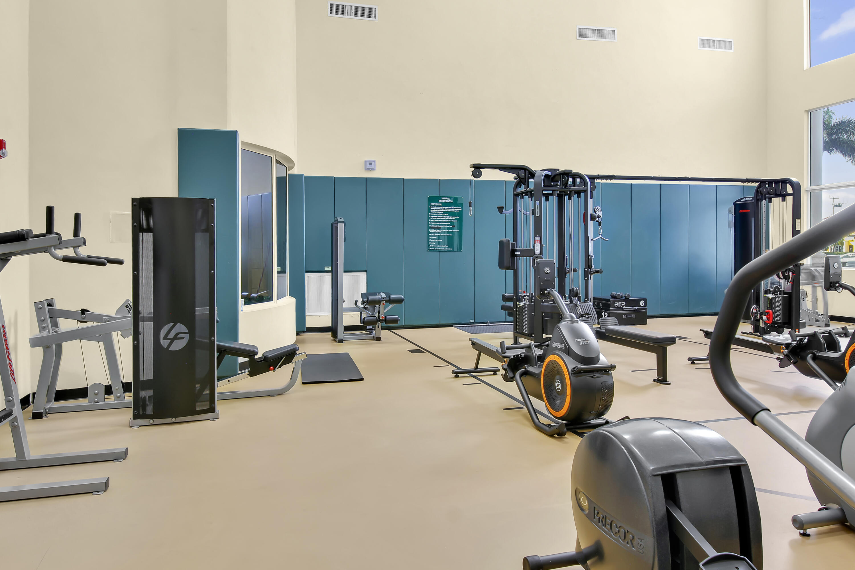 2304 Renaissance Way, Unit 304 Boynton Beach, FL 33426 - Photo 24 of 32 a view of a room with gym equipment