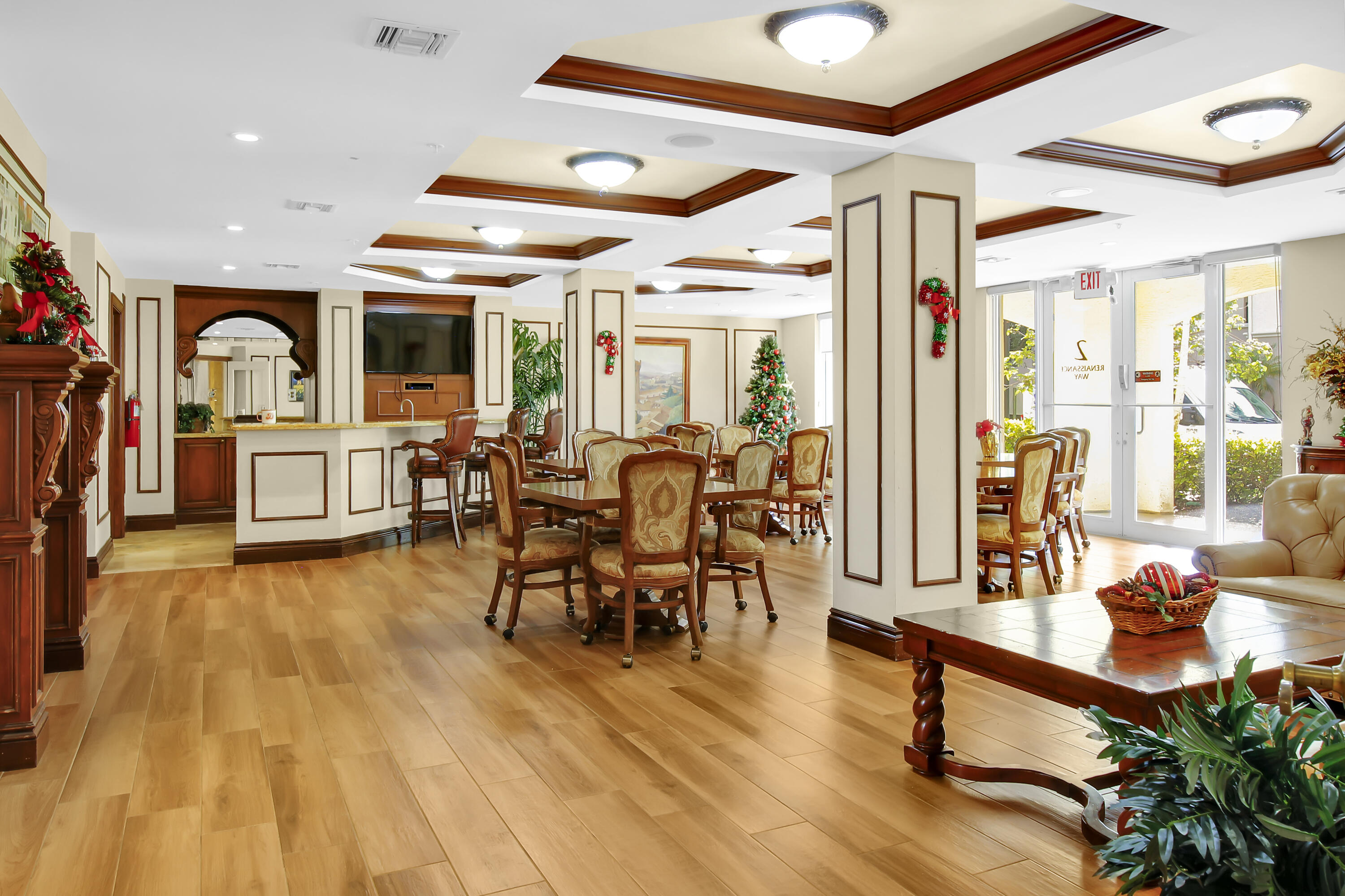 2304 Renaissance Way, Unit 304 Boynton Beach, FL 33426 - Photo 31 of 32 a living room with furniture and a wooden floor