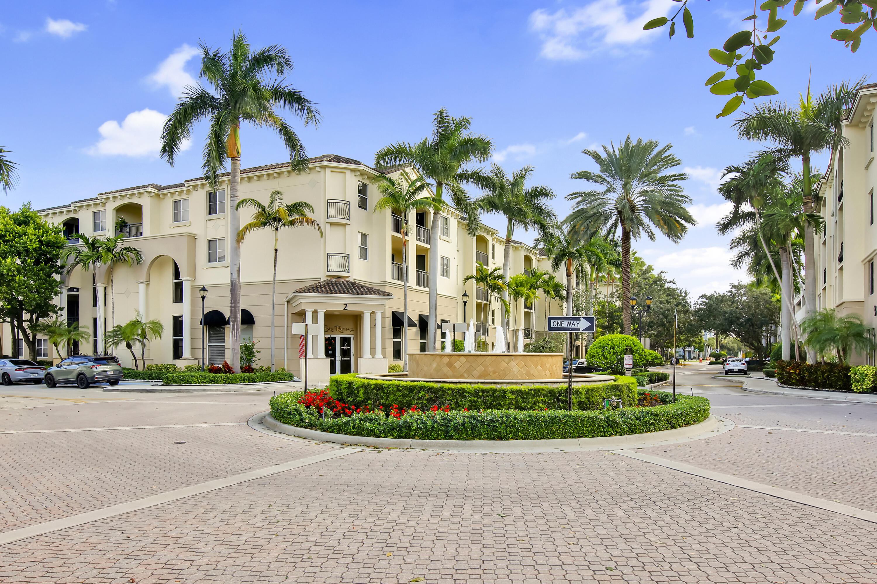 2304 Renaissance Way, Unit 304 Boynton Beach, FL 33426 - Photo 32 of 32 a front view of multiple houses with yard