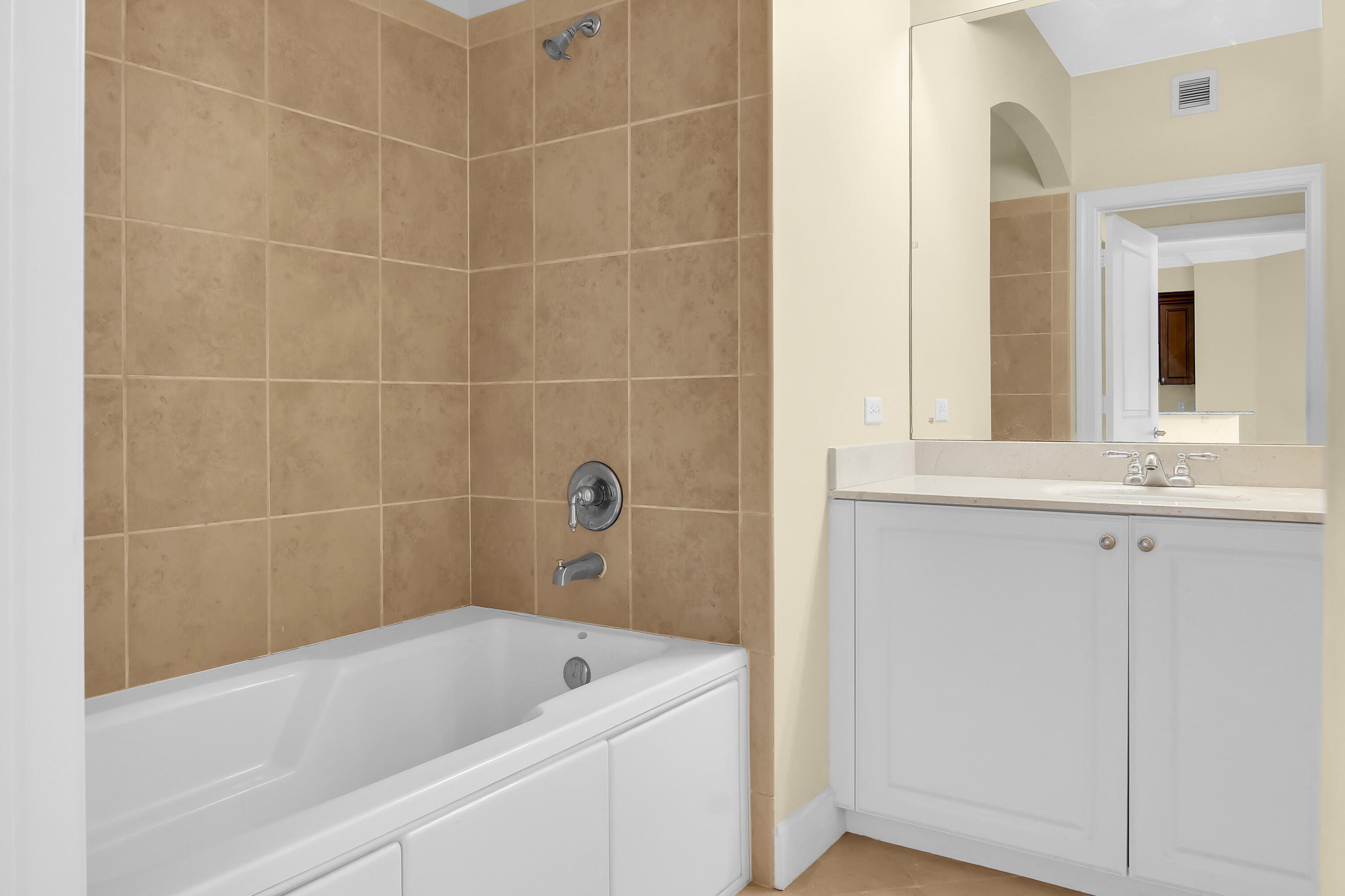 2304 Renaissance Way, Unit 304 Boynton Beach, FL 33426 - Photo 6 of 32 a bathroom with a bathtub and a sink