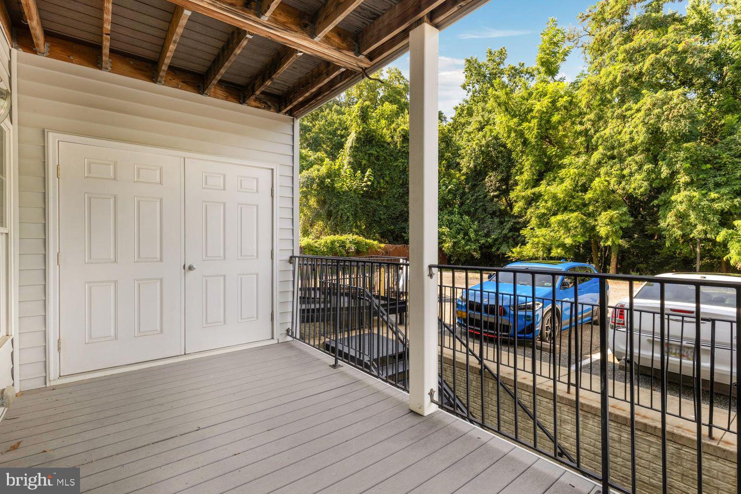 1755 W Street Southeast, Unit A Washington, DC 20020 - Photo 24 of 35 a view of balcony with wooden floor