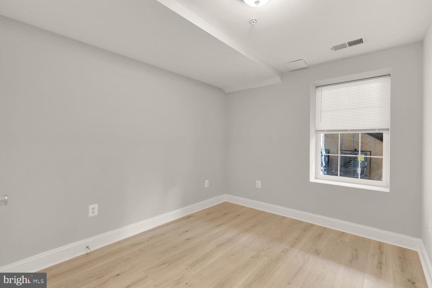 1755 W Street Southeast, Unit A Washington, DC 20020 - Photo 31 of 35 an empty room with a window