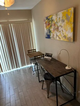 a bathroom with a shower and a bathtub