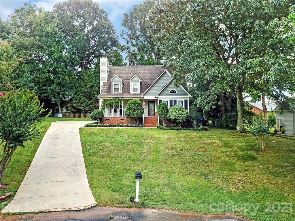 963 Pine Knoll Road Fort Mill, SC 29715 - Photo 22 of 23 a front view of a house with a yard