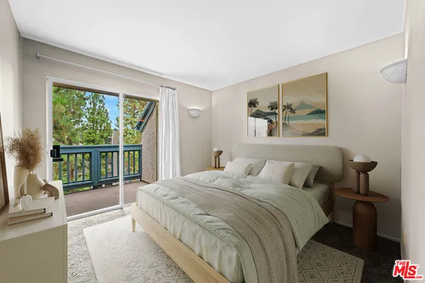 a view of an empty room with glass door