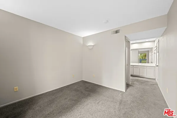 a view of small space with racks on the wall