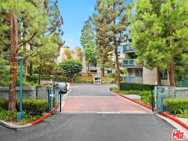 a view of a street with houses